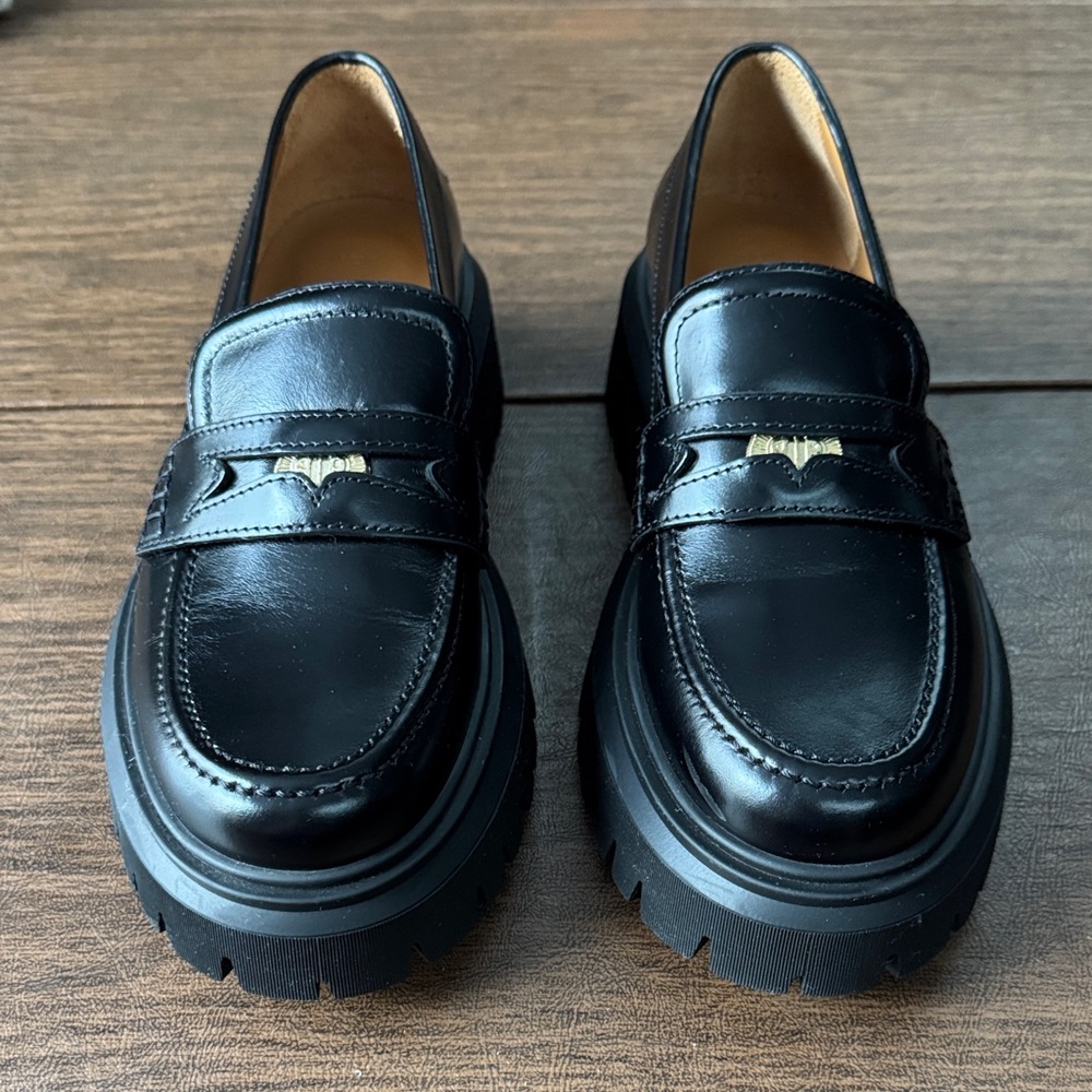 Maje Medaille Leather Platform Loafers in Black with Gold Accents